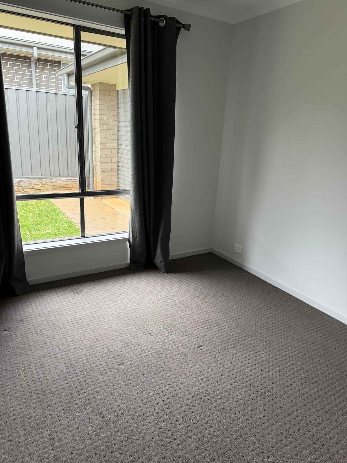 Second bedroom clean with vacuumed carpet - end of lease clean Adelaide