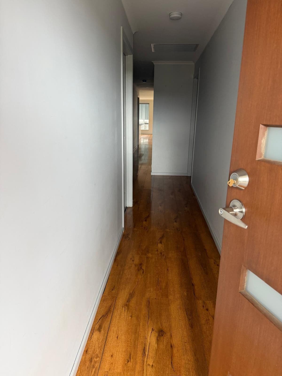 Clean hallway with shining timber floorboards - end of lease clean Adelaide