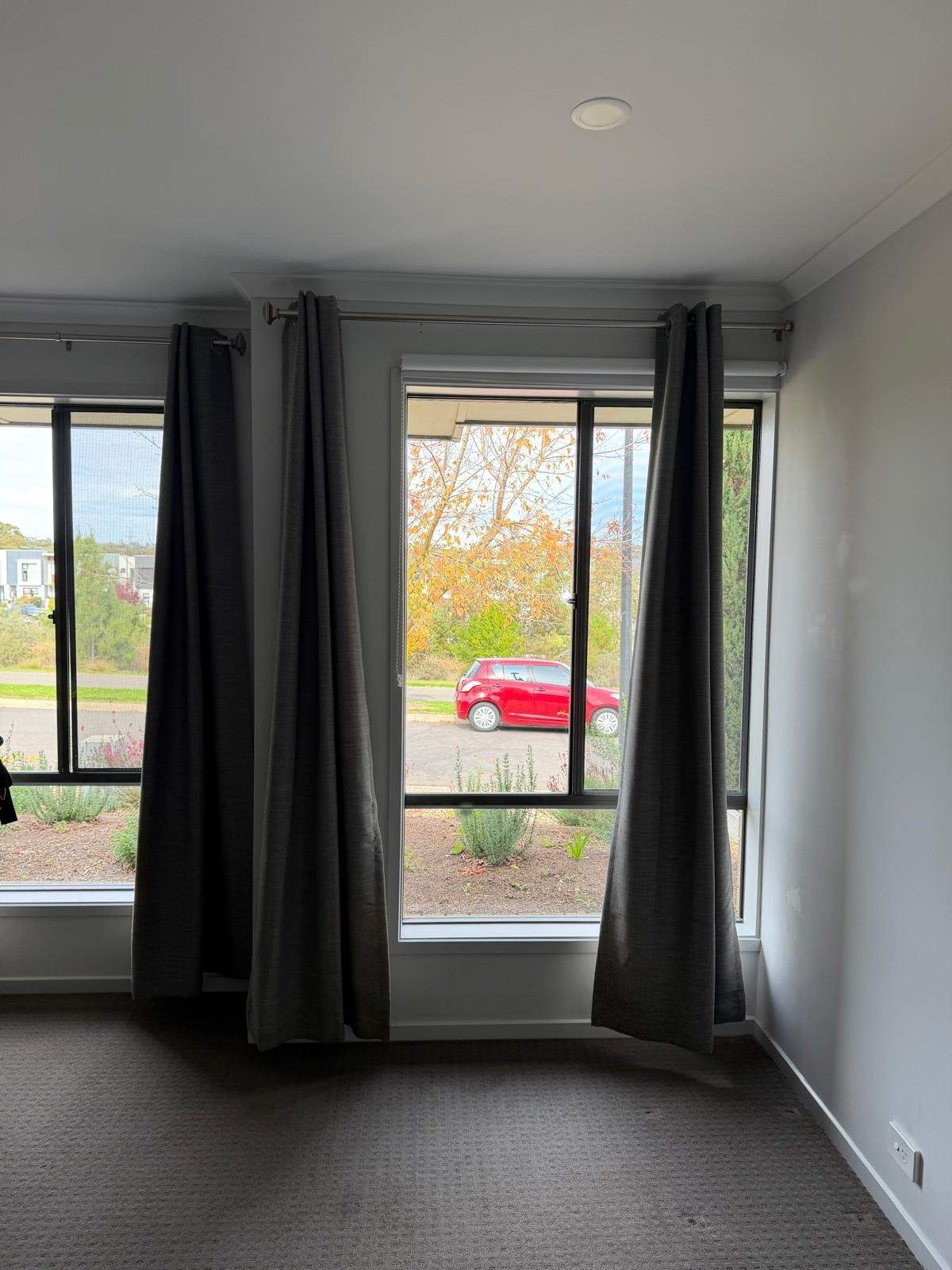 Master bedroom with cleaned curtains and carpet - end of lease clean Adelaide