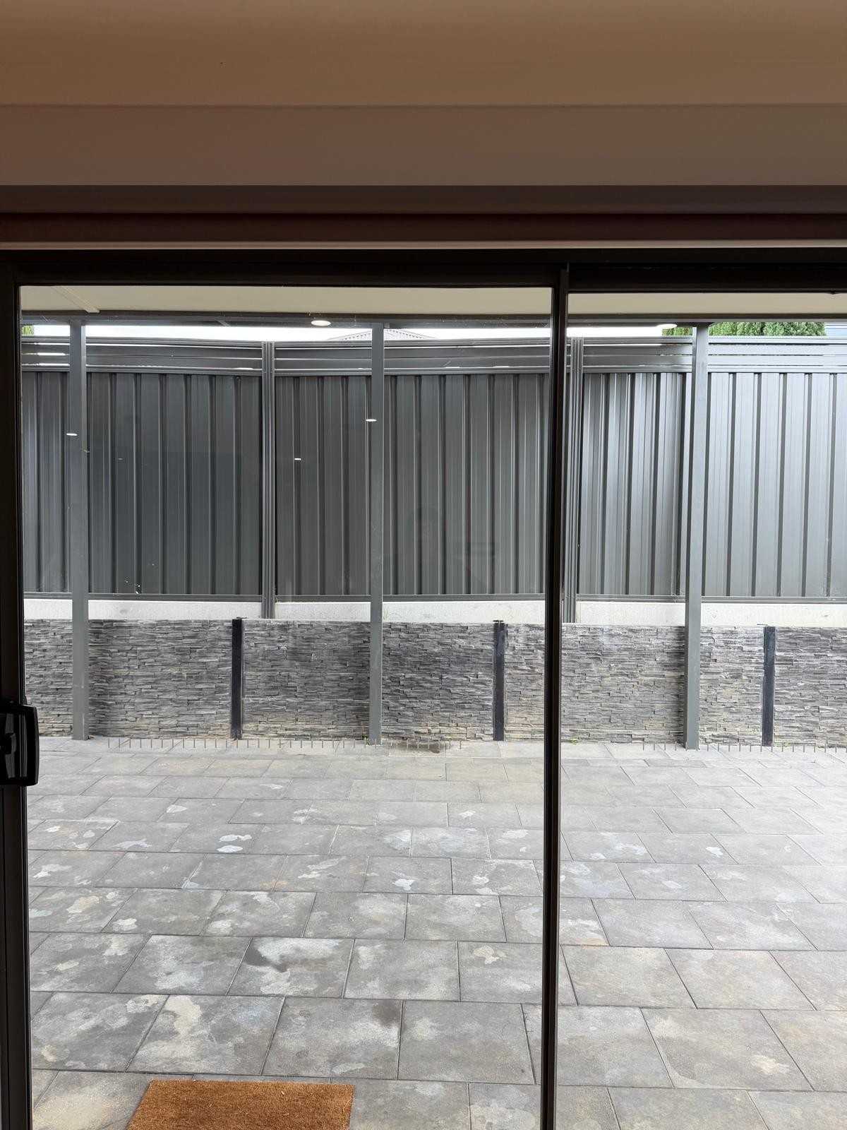Spotless sliding door looking onto clean patio - end of lease Adelaide