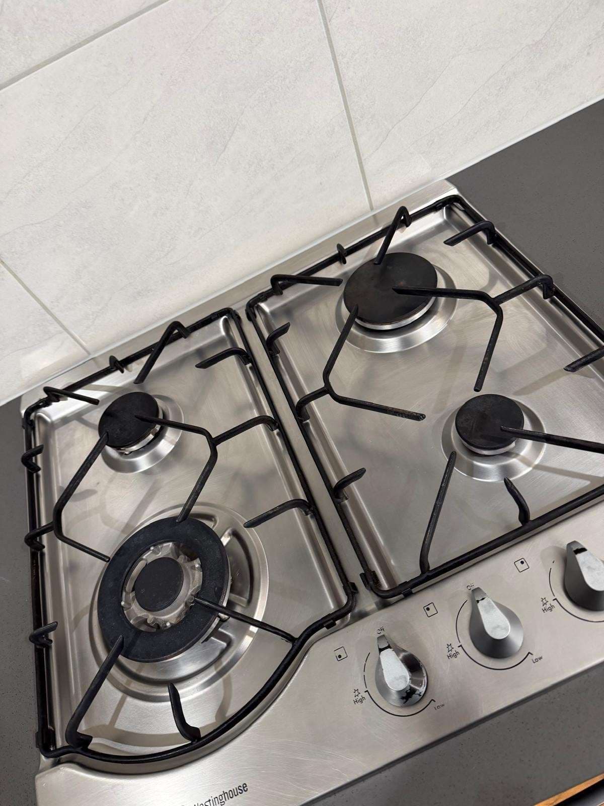 Degreased gas cooktop after deep clean - Scrubhubb Adelaide